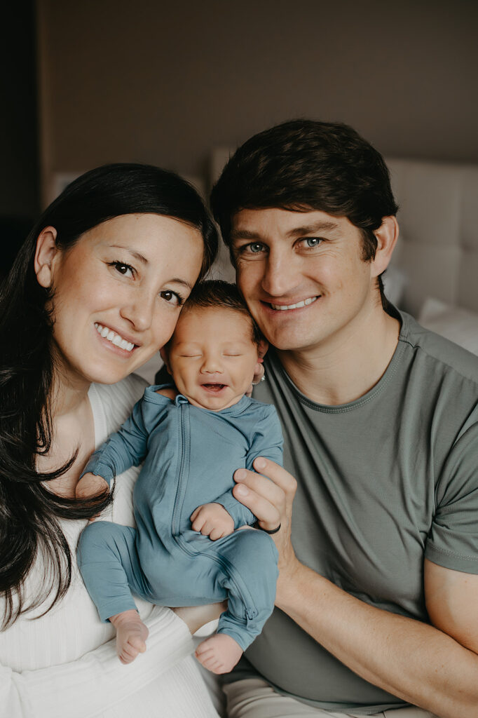 family of three lifestyle newborn photos in Virginia Beach