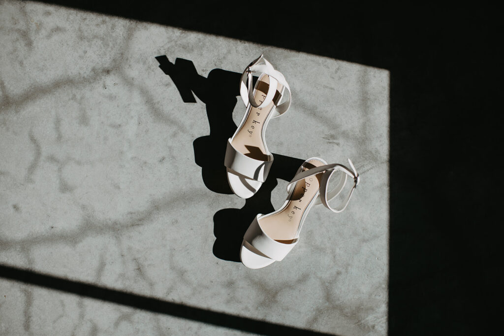 White bride wedding shoes by copper key